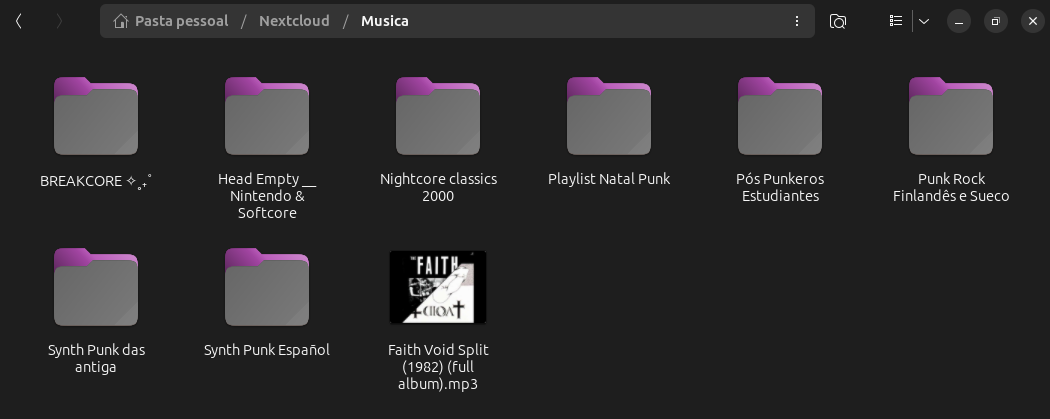 Captura de tela de uma pasta de arquivos no Ubuntu, pasta música, com várias pastas com nomes de playlists que contem outras músicas.