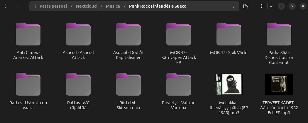 Captura de tela de uma pasta de arquivos no Ubuntu, pasta Punk Rcok Finlandês e Sueco, com várias pastas com nomes de álbuns e outros arquivos mp3 dentro desta pasta.