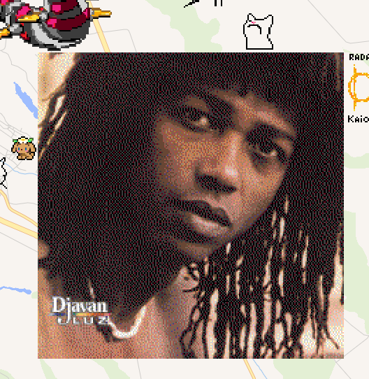 Pixel art do rosto do cantor Djavan. Nota-se que é uma imagem, de qualidade menor, usando a paleta de cores disponível no wplace.